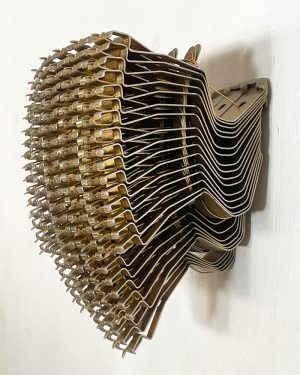 Diana Miller, Masqued, metal wall sculpture