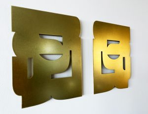 Contemplation (left) in brass, Diana Miller