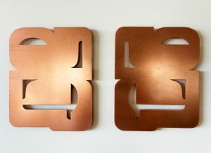 Kinship (right) in copper, Diana Miller